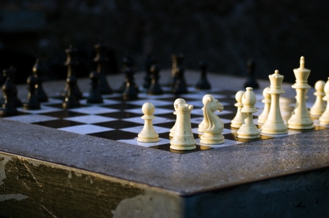 chess set on a concrete table